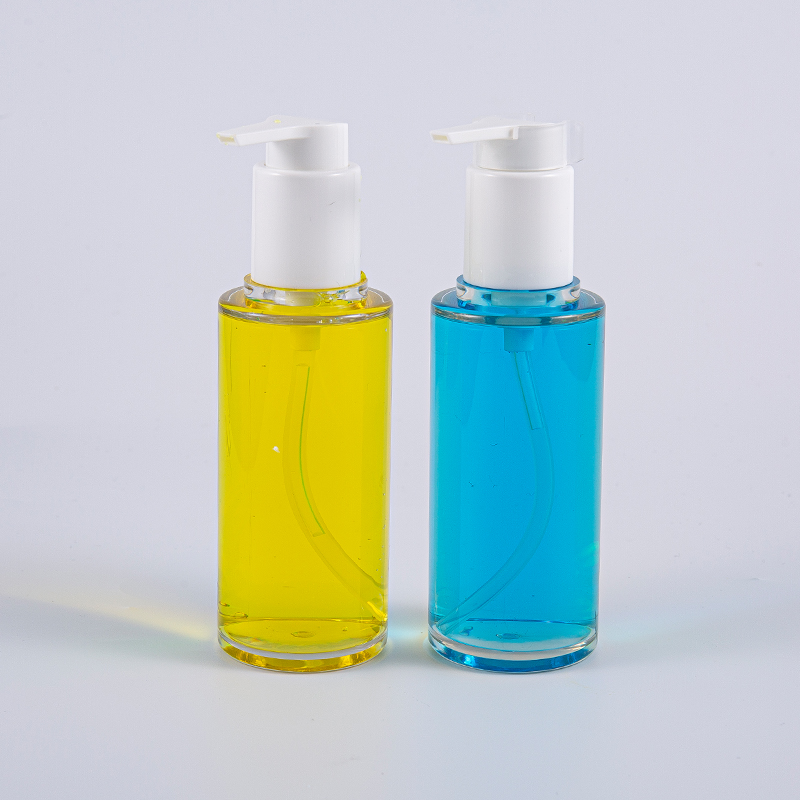Bouteille de lotion de forme ronde PETG Clear PETG avec pompe en plastique blanc
